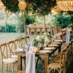 hanging boho chandeliers over tables at wedding venue villa in corfu Greece at villa Sylva