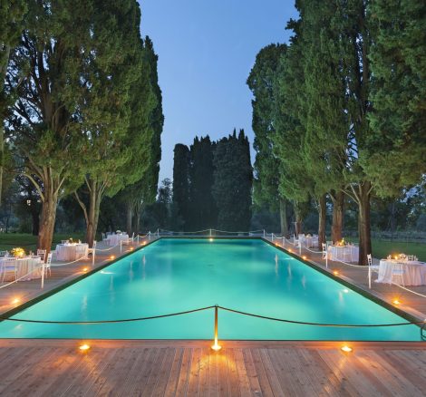 large pool area surrounded by old trees at historical private villa wedding venue in Sorrento Italy villa zagara