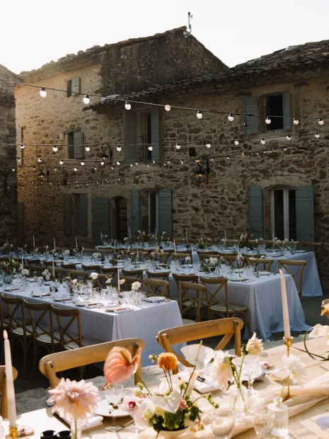 Image of table set up with fairy lights at wedding venue Le Clos du Tuilier, France