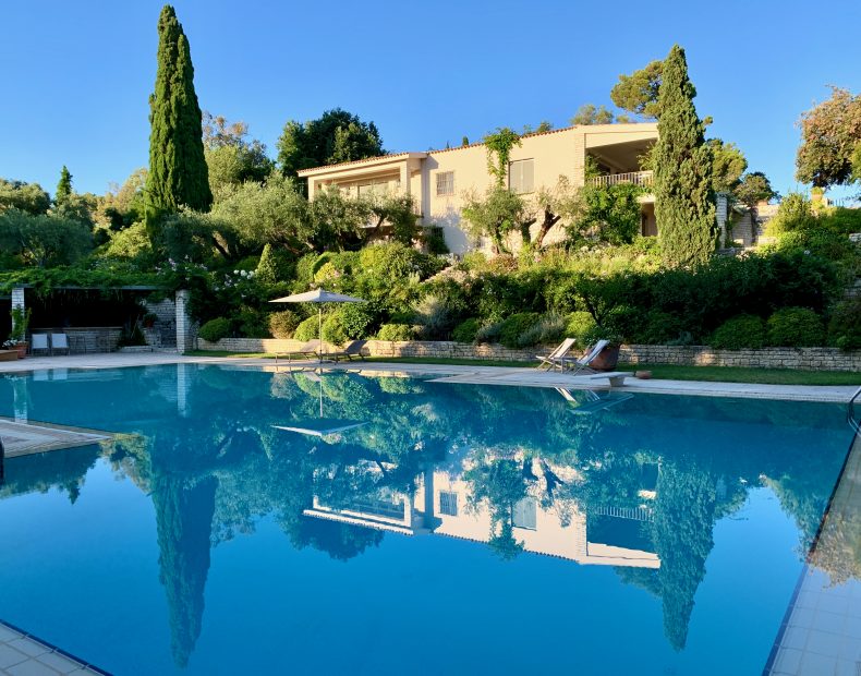 view up over pool towards private villa wedding venue in corfu Greece villa Sylva