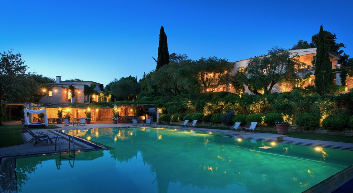 evening view of the pool and garden at wedding venue villa in corfu Greece at villa Sylva