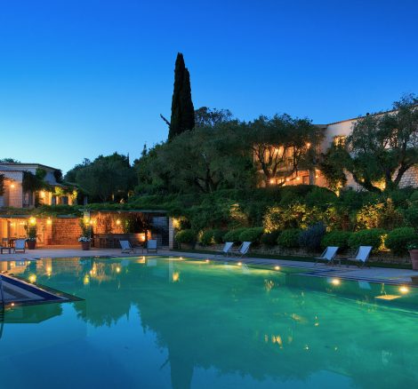 evening view of the pool and garden at wedding venue villa in corfu Greece at villa Sylva