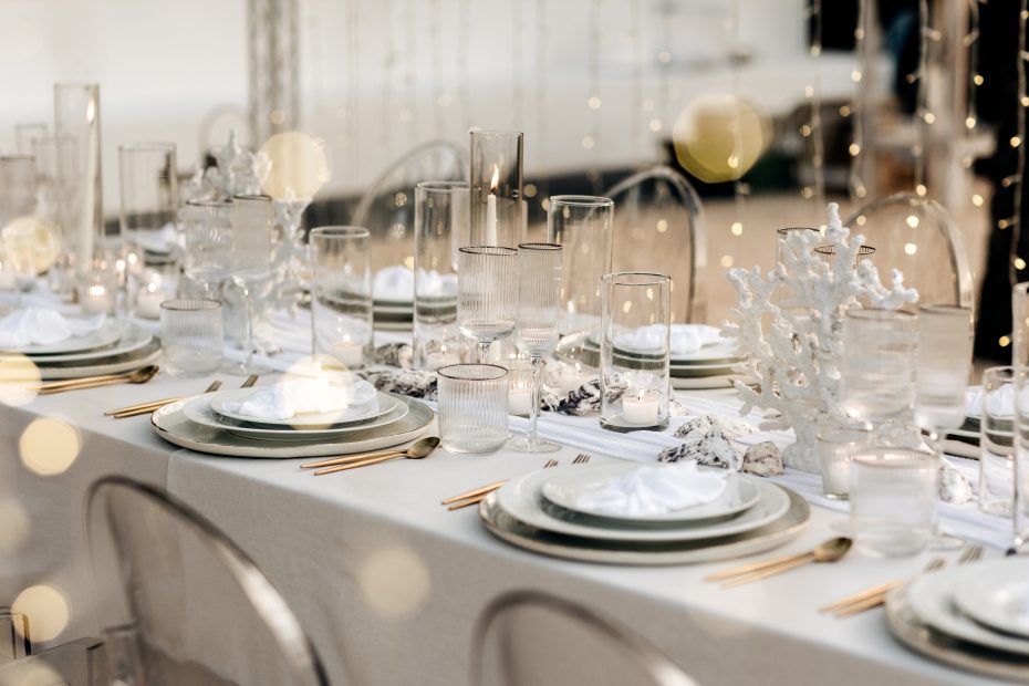 crockery glassware and grey linens for wedding dinner at ibiza wedding venue kazamor ibiza