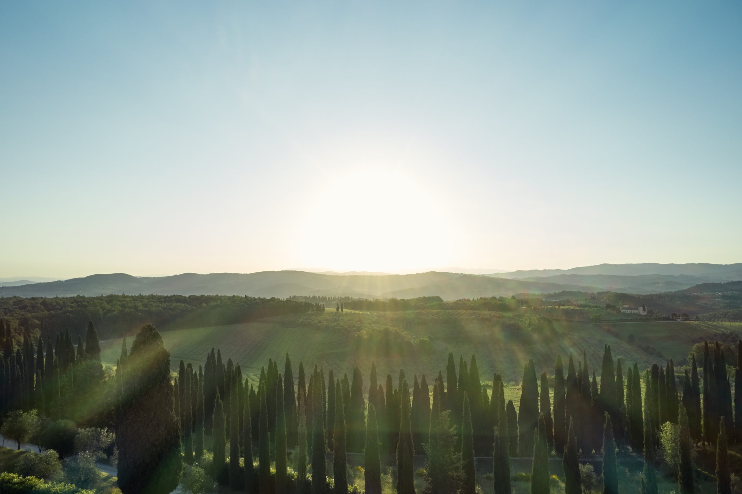 sunrise over the estate at luxury wedding venue in Tuscany COMO Castello Del Nero