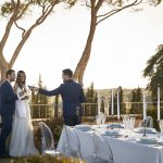 bride and groom during wedding breakfast outdoors at luxury wedding venue in Tuscany COMO Castello Del Nero
