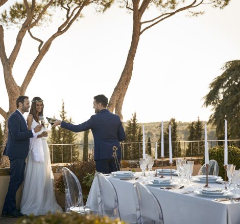 bride and groom during wedding breakfast outdoors at luxury wedding venue in Tuscany COMO Castello Del Nero