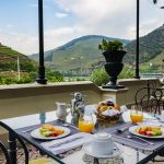 breakfast on the outside terrace the vintage house hotel at portugal wedding venue in Douro valley