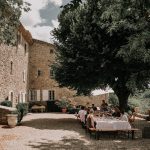 dining outside with guests the day before the wedding at wedding venue in france provence le domaine du rey