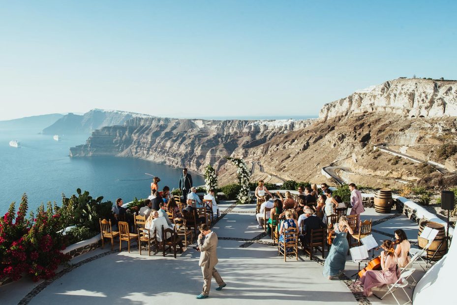 clifftop ceremony at wedding venue in Santorini venetsanos winery