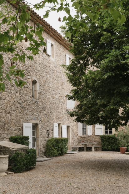 white shutters on rustic french wedding venue domaine du rey in provence