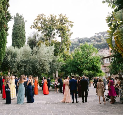 wedding guests mingling before the ceremony at historical private villa wedding venue in Sorrento Italy villa zagara