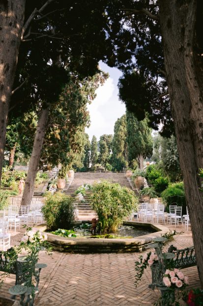 fountain in the gardens at historical private villa wedding venue in Sorrento Italy villa zagara