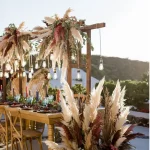 close up of boho pampas and decor for intimate wedding at wedding venue in Santorini venetsanos winery