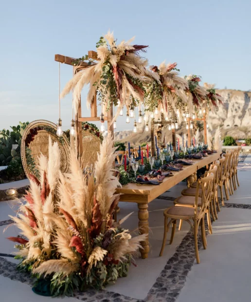 close up section of wedding tables for boho wedding at wedding venue in Santorini venetsanos winery