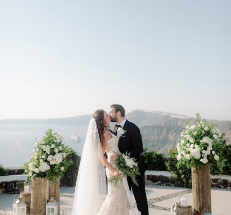 bride and groom say I do at wedding venue in Santorini venetsanos winery