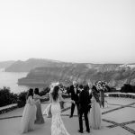 wedding guests at wedding venue in Santorini venetsanos winery