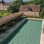 pool and grounds at chateau wedding venue in france chateau de vallery