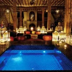 indoor pool area at chateau wedding venue in france chateau de vallery