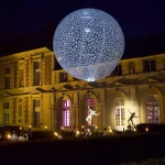 incredible outside light show for a wedding at chateau wedding venue in france chateau de vallery