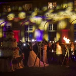 light display against chatea de vallery wedding venue in france