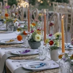 wedding table with colourful candlesticks at wedding venue in tuscany villa lena