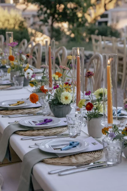 wedding table with colourful candlesticks at wedding venue in tuscany villa lena