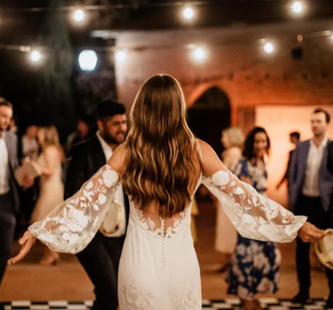 bride dancing at her wedding at wedding venue villa lena in tuscany