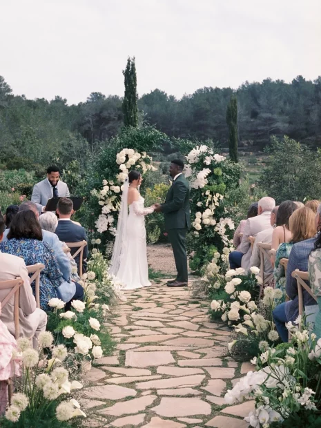 Couple at end of aisle at wedding venue Masia Cabellut, Spain