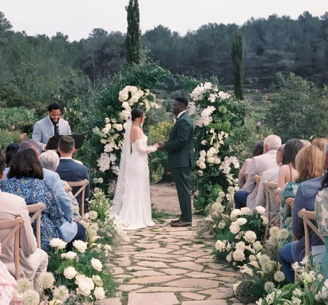 Couple at end of aisle at wedding venue Masia Cabellut, Spain