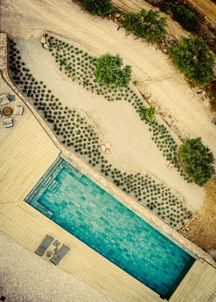 aerial shot of rectangular pool area at vineyard wedding venue in Barcelona Spain Masia cabellut