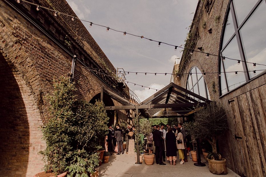 Festoon lighting over the courtyard at 100 Barrington, a unique wedding venue in south London