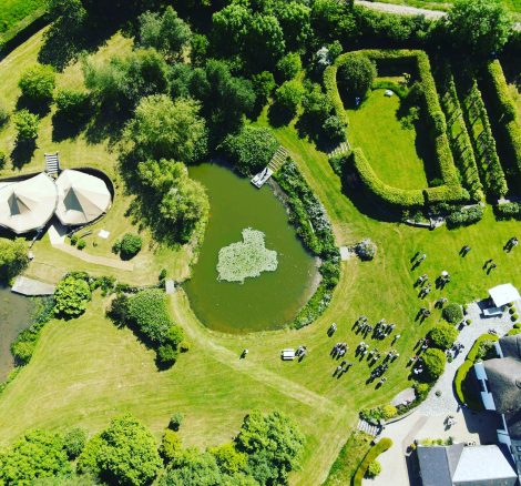 east hele wedding venue in Devon aerial view of tipi and lake