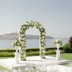 Arch at end of aisle at wedding venue Sea View by en Kipo