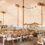 Al fresco wedding reception with long tables and string lights at Andalusian estate venue