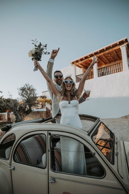 Married Couple in car at wedding venue Can Frare, Ibiza