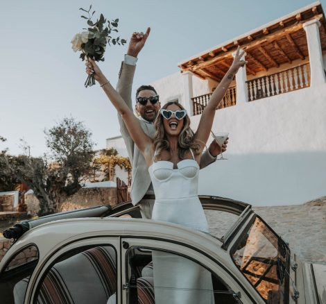 Married Couple in car at wedding venue Can Frare, Ibiza