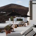 Sun beds and view of volcano at wedding venue Courtesy of César Lanzarote