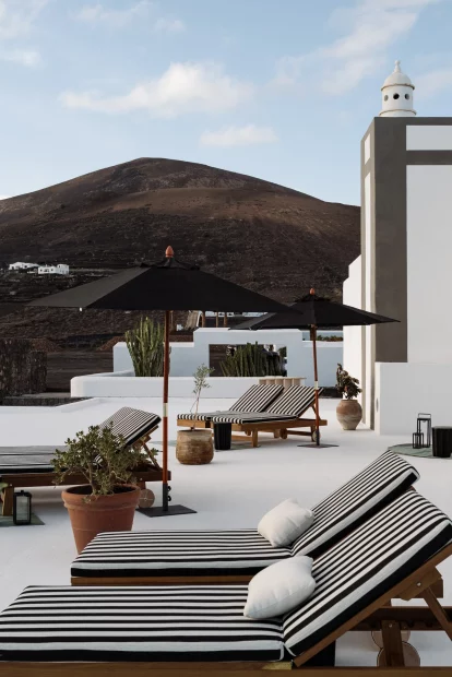 Sun beds and view of volcano at wedding venue Courtesy of César Lanzarote