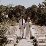 Couple down aisle at wedding venue Fincadelica San Lorenzo, Ibiza
