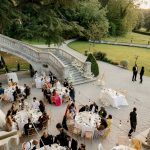Image of tables and wedding guests at wedding venue Chateau Bouffemont