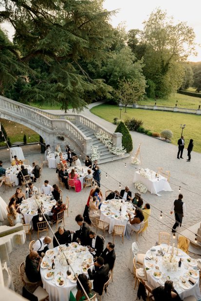 Image of tables and wedding guests at wedding venue Chateau Bouffemont