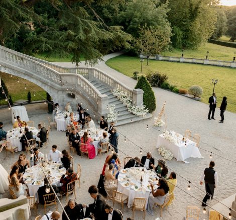Image of tables and wedding guests at wedding venue Chateau Bouffemont