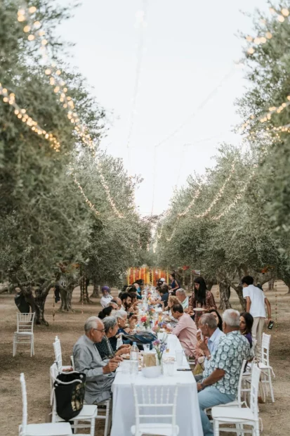 al fresco dining amongst olive trees at wedding venue Arbora Olea Luxury Resorts, Greece