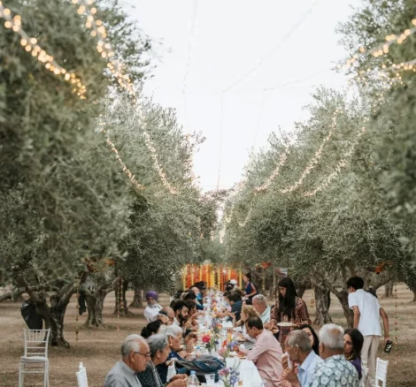 al fresco dining amongst olive trees at wedding venue Arbora Olea Luxury Resorts, Greece