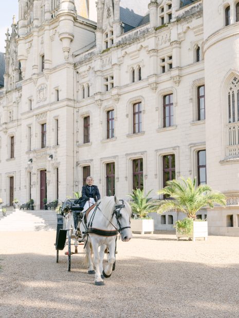Image of a horse and carriage ride at wedding venue Chateau Challain