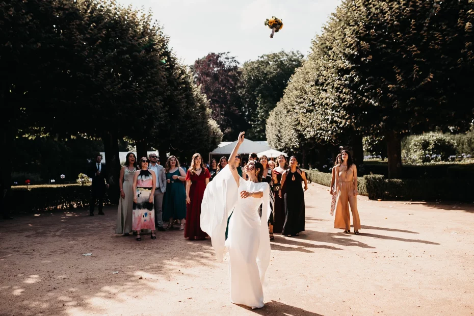 Image of bride throwing her bouquet