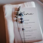 Image of menu on plate with lavender at wedding Venue Quinta do Jordão
