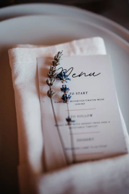 Image of menu on plate with lavender at wedding Venue Quinta do Jordão