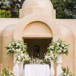 Image of chapel with white flowers at wedding venue Ktima Orizontes, Athens, Greece