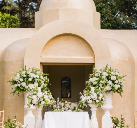 Image of chapel with white flowers at wedding venue Ktima Orizontes, Athens, Greece